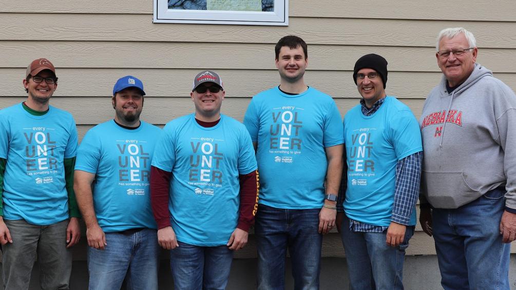 group of employees volunteering for habitat for humanity