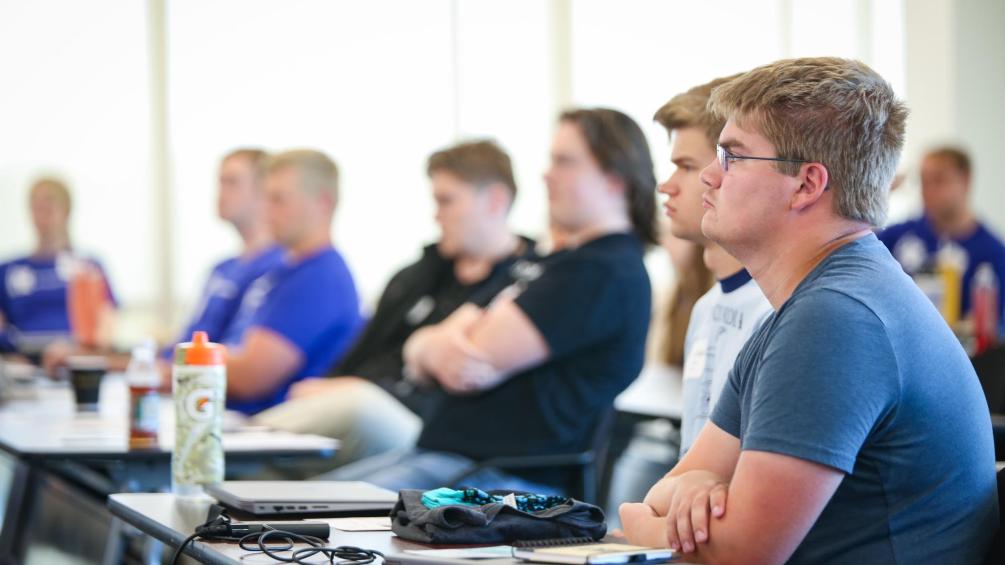 Interns Listening at Intern Gathering